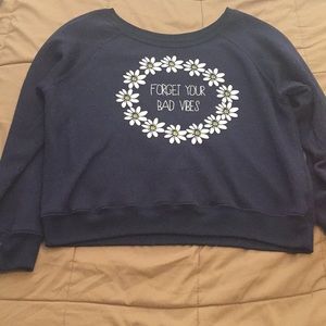 Forget your bad vibes and buy this sweater